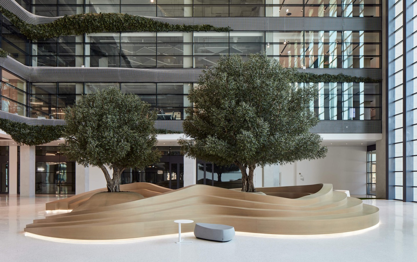 artificial olive trees in large atrium