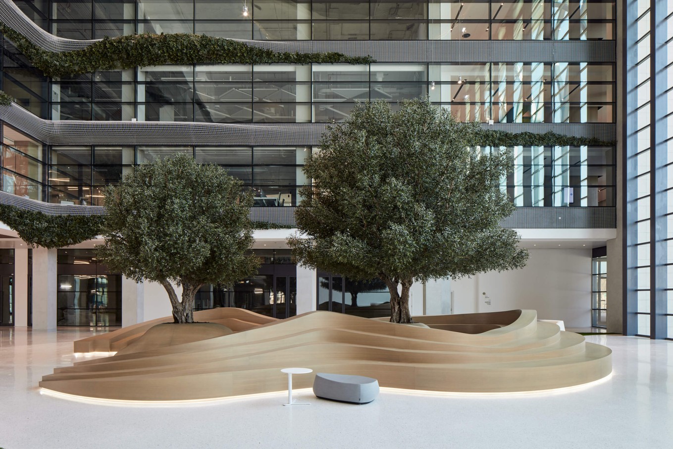 artificial olive trees in large atrium